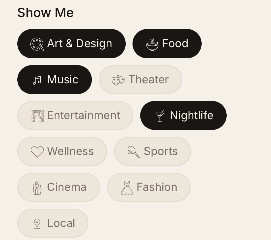 The app&rsquo;s Show Me screen: category chips for Art & Design, Food, Music, Theater, Entertainment, Nightlife, and more, with a few selected